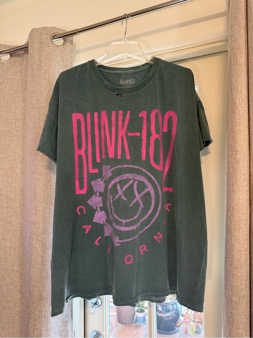 Blink-182 Women’s Black Short Sleeve Graphic Tee with Pink Logo